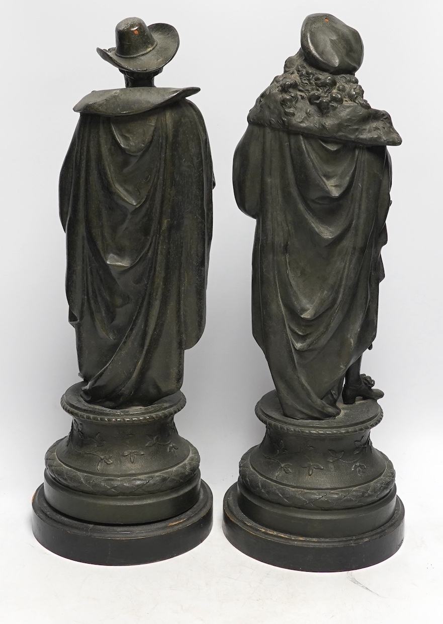 A pair of early 20th century spelter figures of cavaliers, 49cm